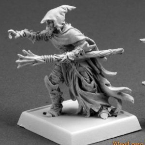 A male dark elf sorcerer advancing. He is dressed is a close fitting shirt, with trousers and a skirt over the top. His head is covered by a long hood that ends in a point. His cloak is long and ragged on the edges. He carries his horizontal staff with one hand. His other is empty but outstretched as if casting a spell.