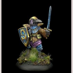 A male kenku fighter standing still. He wears a mixtures of cloth clothing with some armour pieces visible. In one hand he holds an upright longsword. His other holds a metal shield close to his body.