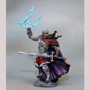 A bearded male human paladin standing defensively. He wears ornate full plate armour and an open face helmet. Fine robes hang from below his breastplate. He holds his sword in one hand, across his lower body. His other hand is raised and holds a magical lightning.