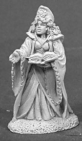 A female human wizard dressed in fine flowing robes with long drooping sleeves. She has an ornate hat on her head, and her long hair falls to her waist. In one hand she holds an open spellbook. The other is empty but gestures as if casting a spell.