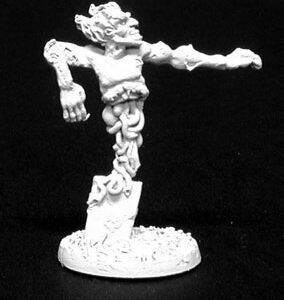 A male humanoid appearing ghost materialising up from a gravestone. His head, torso and arms are visable. His lower body is just etheral smoke. Unpainted metal RPG tabletop gaming miniature.