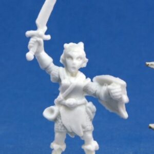 A young female gnome holding a sword above her head with one hand, and a shield by her side with the other. Unpainted plastic RPG tabletop gaming miniature.